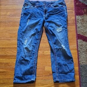 Distressed Blue Jeans